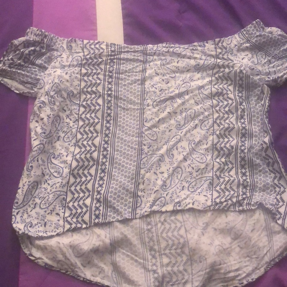 A off the shoulder top that is blue and white